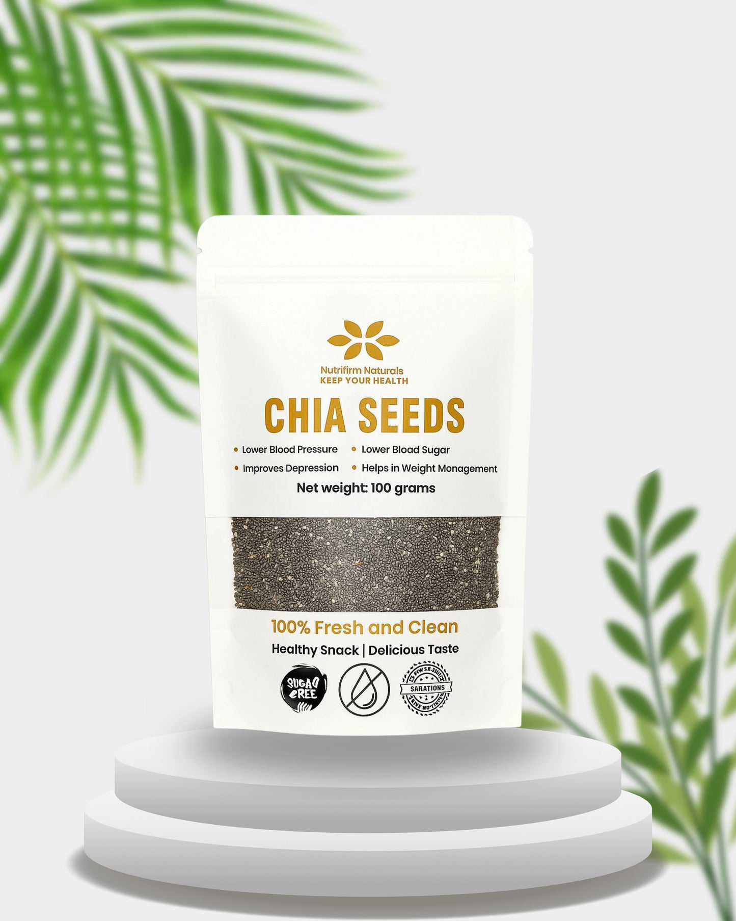 Bag of chia seeds with a label on a white pedestal against a light background with green leaves.