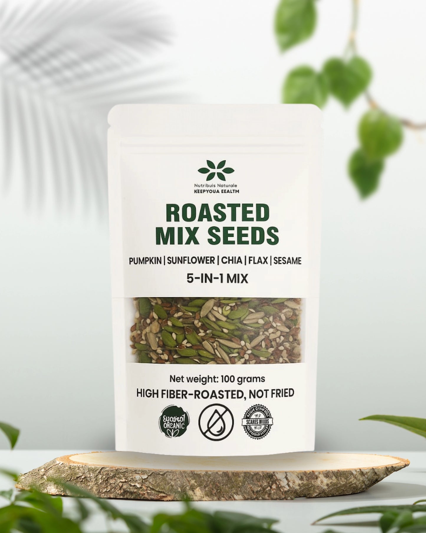 Bag of roasted mix seeds with greenery in the background