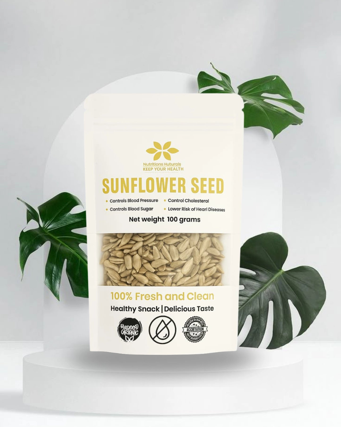 Sunflower seed packaging with a white background and green leaves.