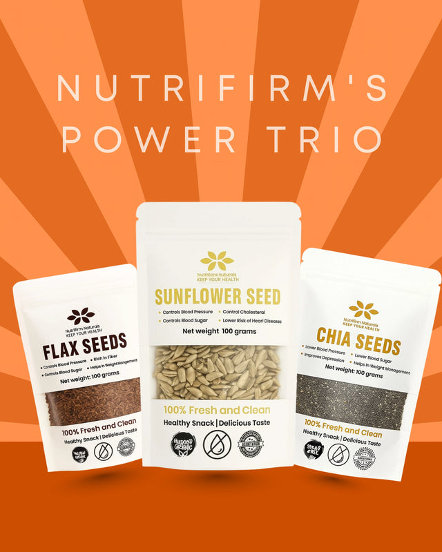 Three packages of Nutrifirm's Power Trio flax seeds, sunflower seeds and chia seeds on an orange background