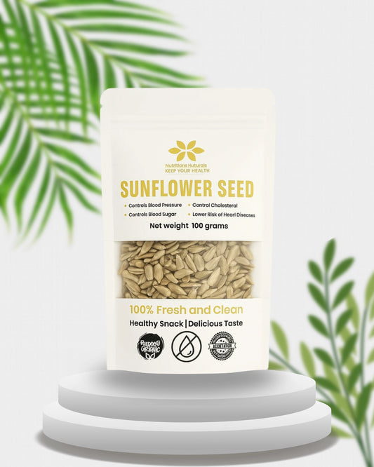 Sunflower seed packaging on a white pedestal with green leaves in the background